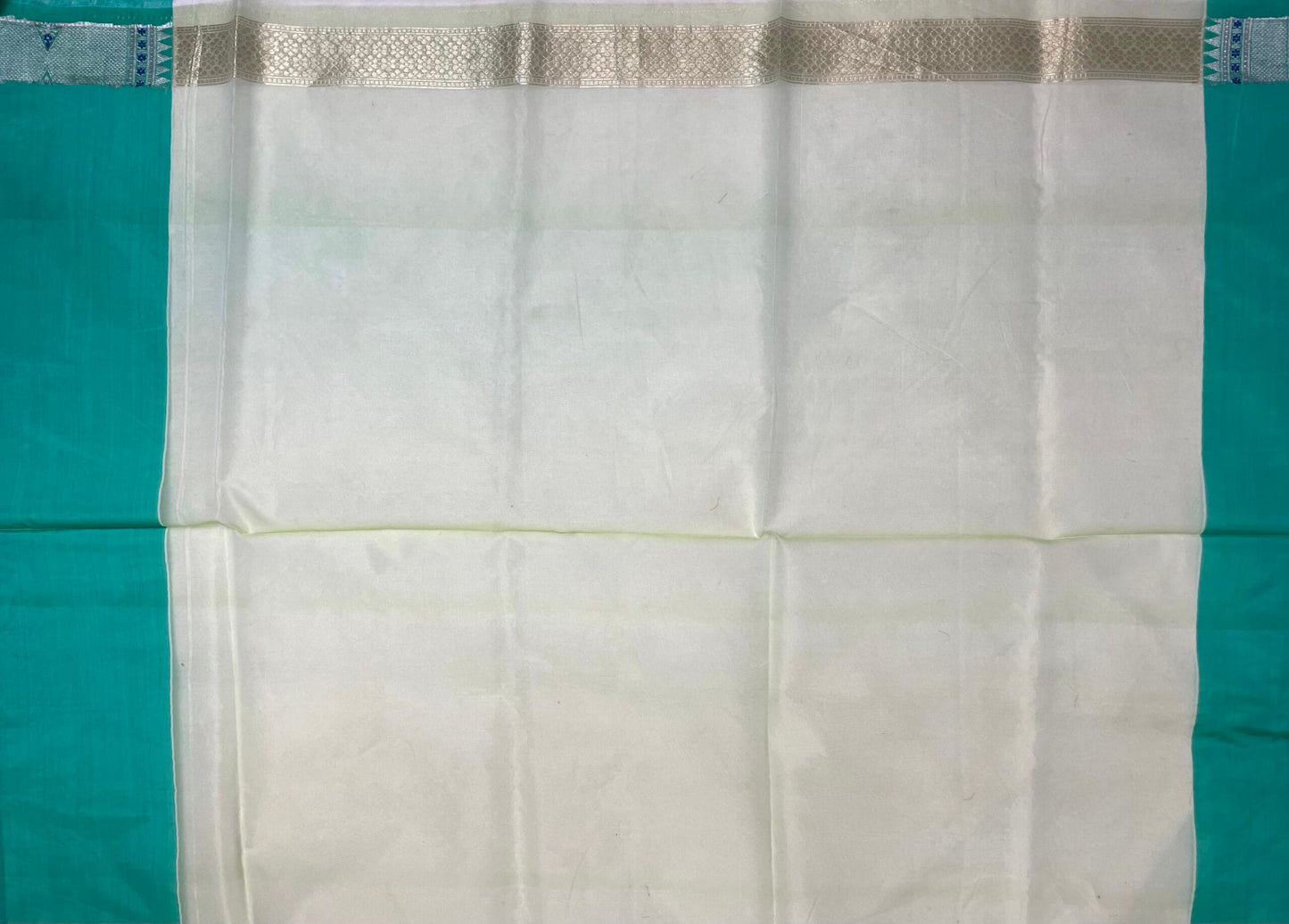 Sea Blue Organza Saree with Contrast Border and Allover Geometrical Body Design b0280ds