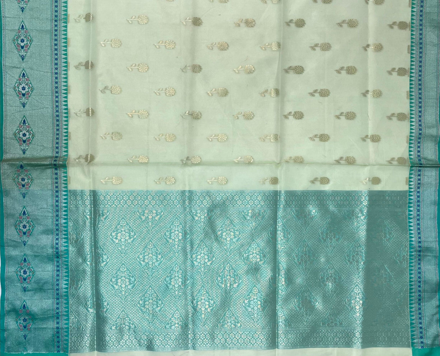 Sea Blue Organza Saree with Contrast Border and Allover Geometrical Body Design b0280ds