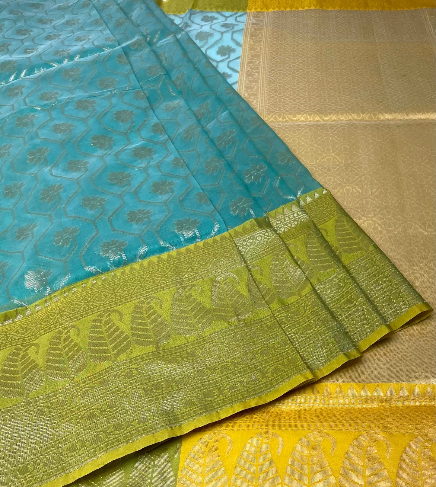 Mustard and Light Blue Organza Saree with Contrast Border and Allover Geometrical Body Design b0281ds