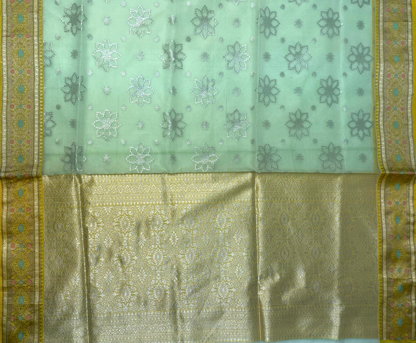 Yellow and Teal Organza Saree with Contrast Border and Allover Geometrical Body Design b0284ds