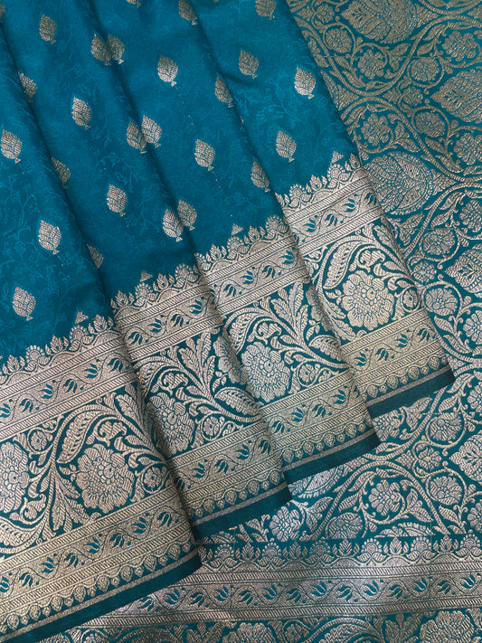Teal Blue Katan Banarasi Saree with Silver Zari Floral Weaving And Grand Pallu B0589ds