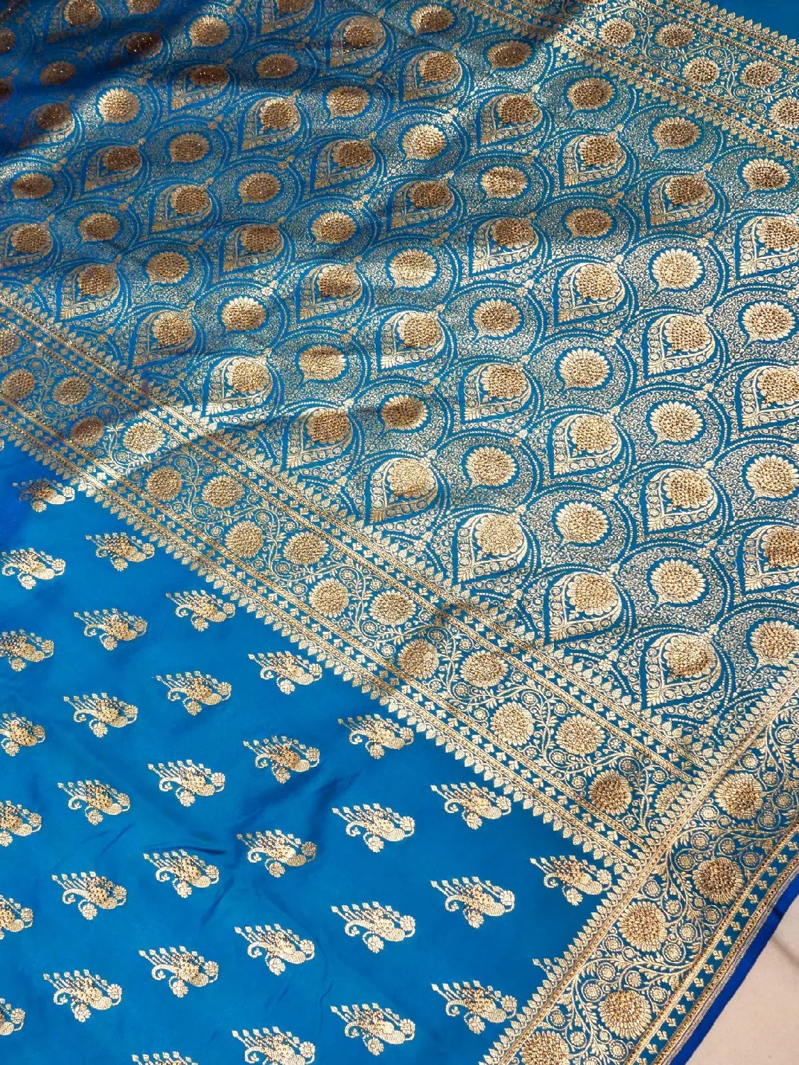 Frozi Blue Banarasi Silk Saree with Crystal Stone Work Embellishments & Gold Zari Swarovski Work Butta DSK0065