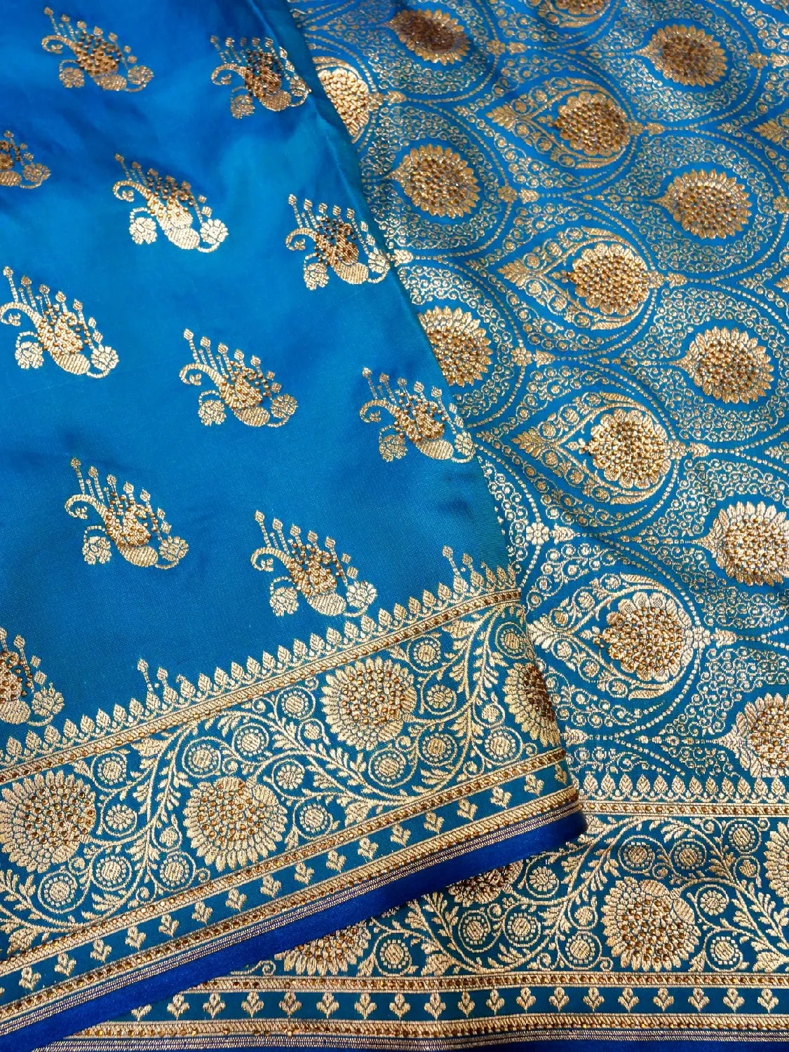 Frozi Blue Banarasi Silk Saree with Crystal Stone Work Embellishments & Gold Zari Swarovski Work Butta DSK0065
