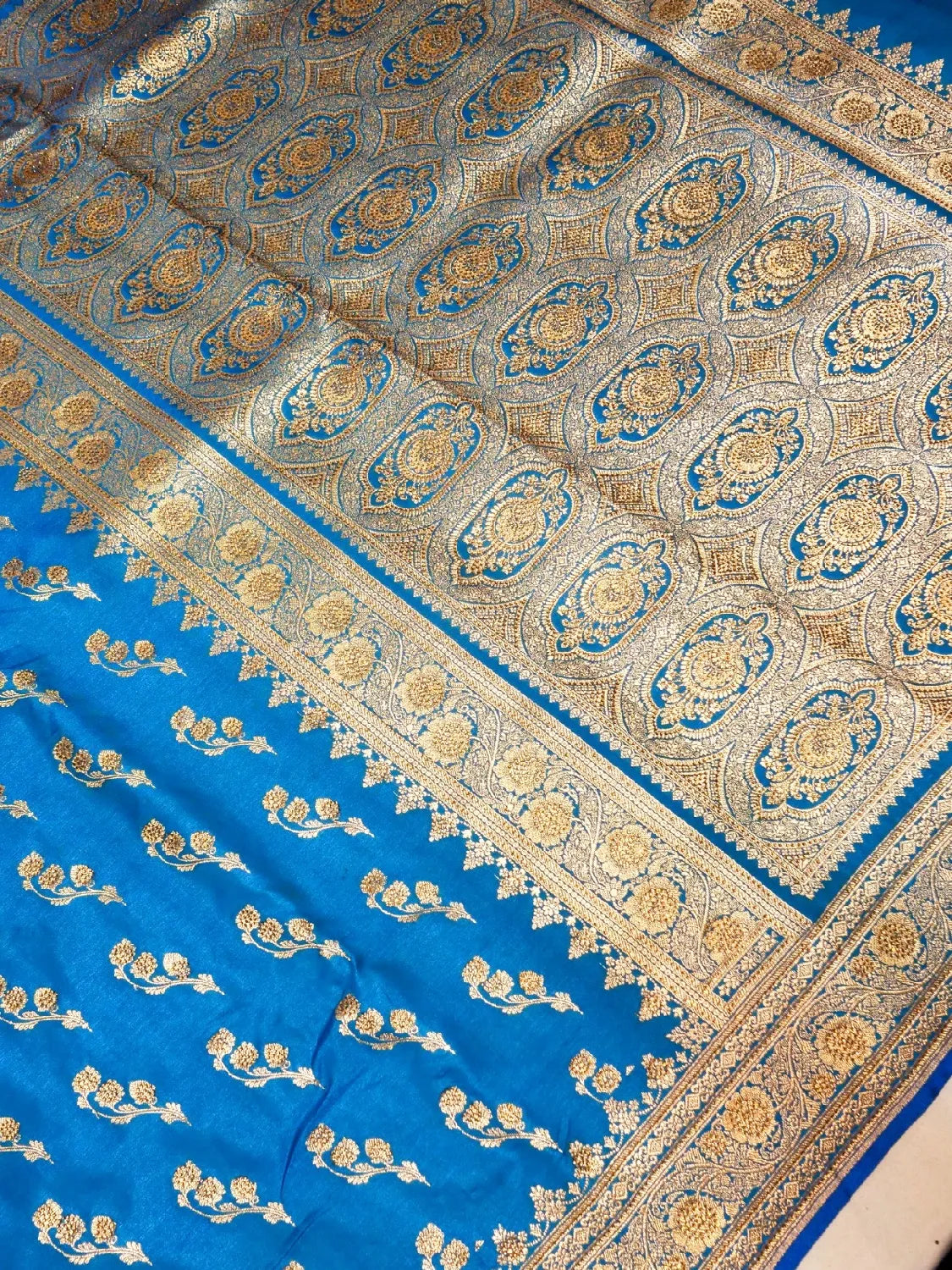 Azure Blue Banarasi Silk Saree with Crystal Stone Work Embellishments & Delicate Zari Sprigs & Swarovski Work Floral Butta DSK0067
