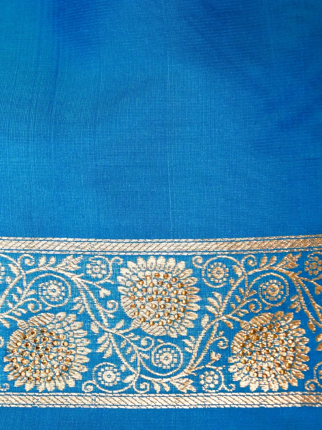 Frozi Blue Banarasi Silk Saree with Crystal Stone Work Embellishments & Gold Zari Swarovski Work Butta DSK0065