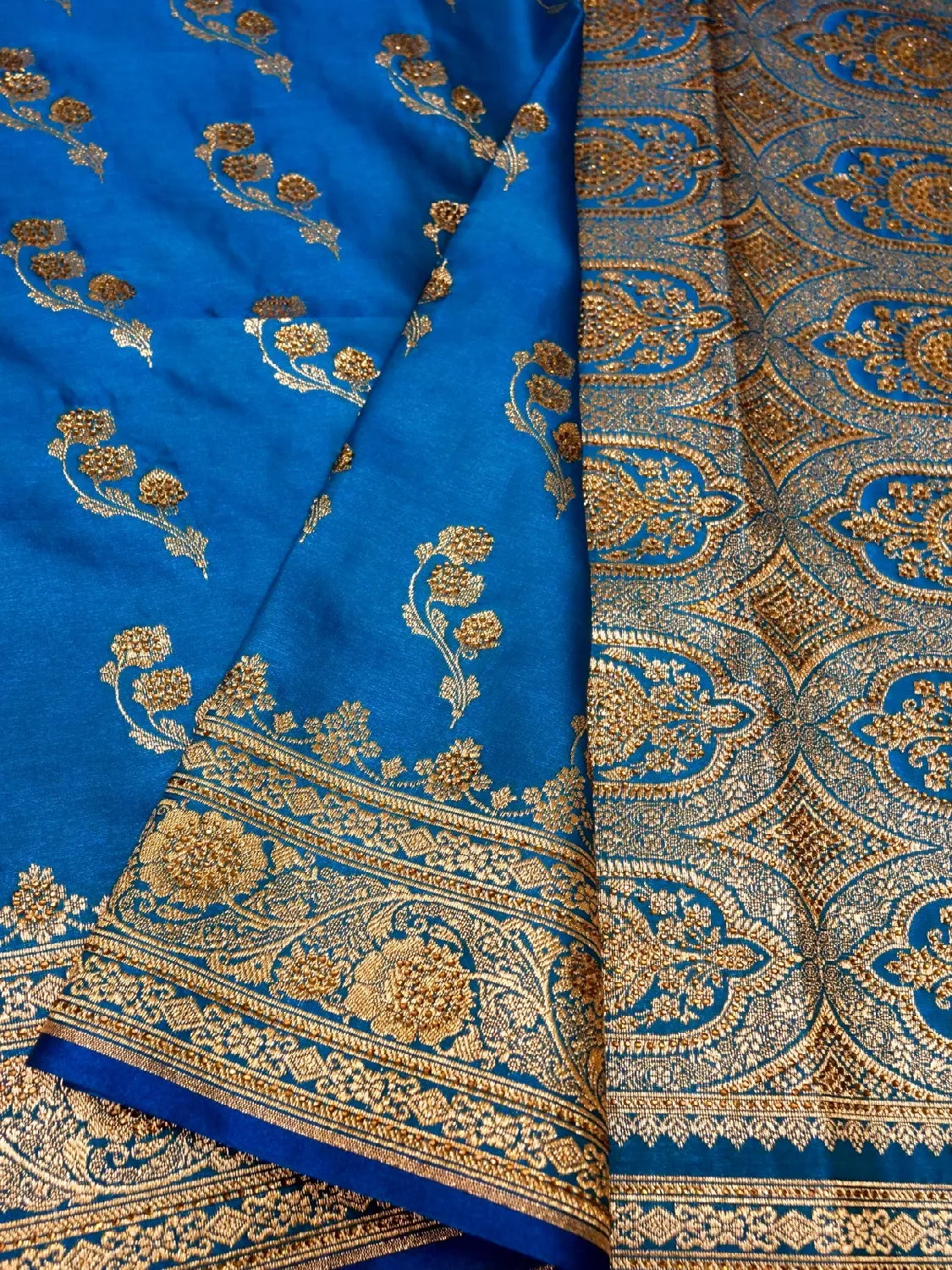Azure Blue Banarasi Silk Saree with Crystal Stone Work Embellishments & Delicate Zari Sprigs & Swarovski Work Floral Butta DSK0067