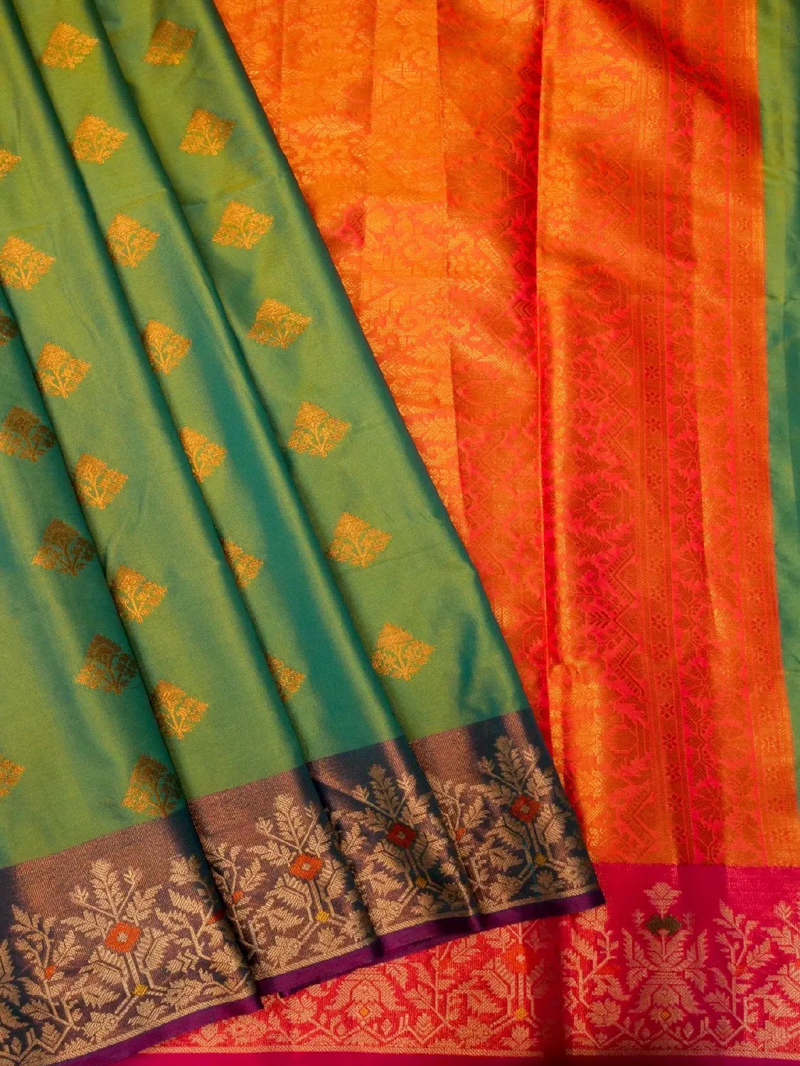 Handloom Leaf Green Banarasi Silk Saree with Contrast Violet Border & Tree Motifs DSK00121