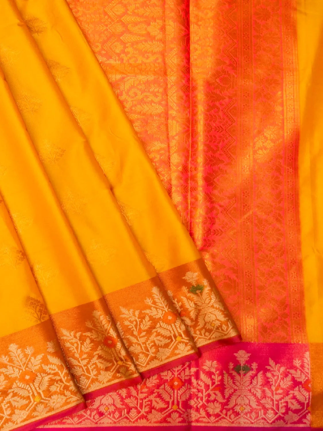 Handloom Turmeric Yellow Banarasi Silk Saree with Contrast Orange Border & Pink Pallu DSK00115
