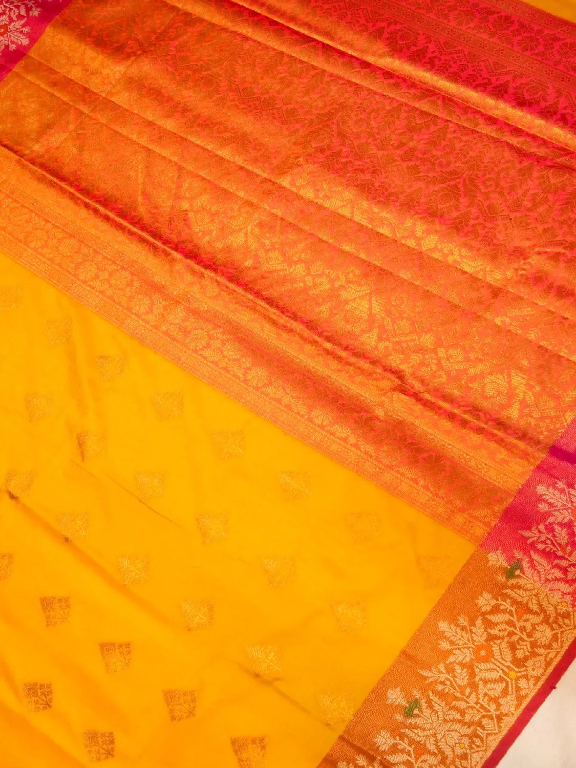 Handloom Turmeric Yellow Banarasi Silk Saree with Contrast Orange Border & Pink Pallu DSK00115