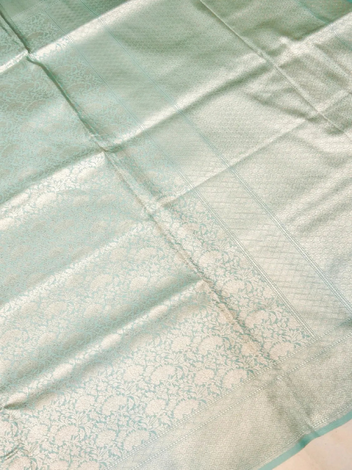 Handloom Ice Blue Banarasi Silk Saree with golden Zari Jangla Weave DSK0085