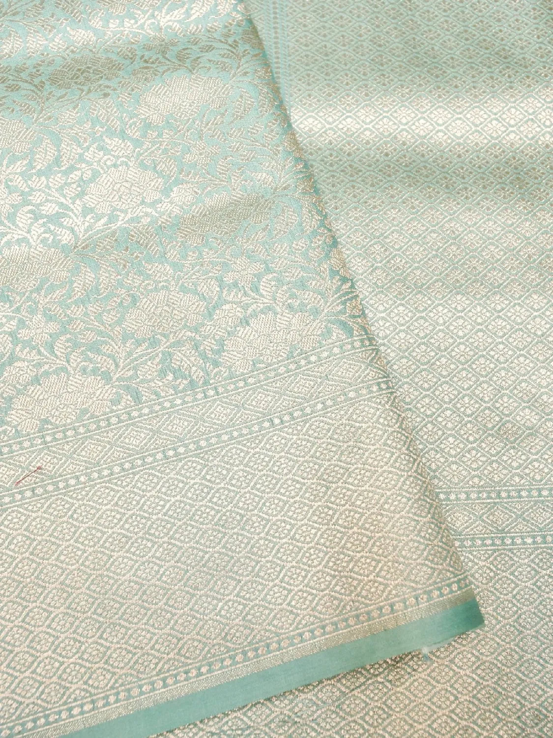 Handloom Ice Blue Banarasi Silk Saree with golden Zari Jangla Weave DSK0085