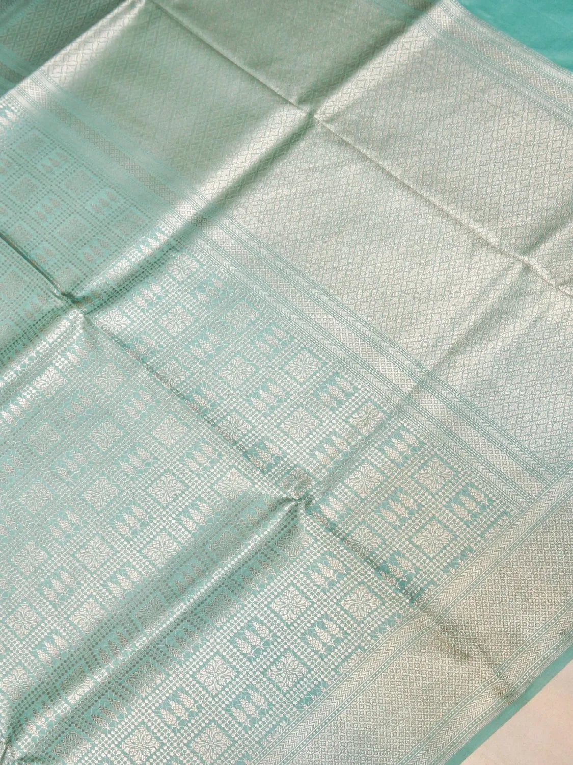 Handloom Firozi Turquoise Banarasi Silk Saree with Golden Zari Geometric Floral Checks DSK0097