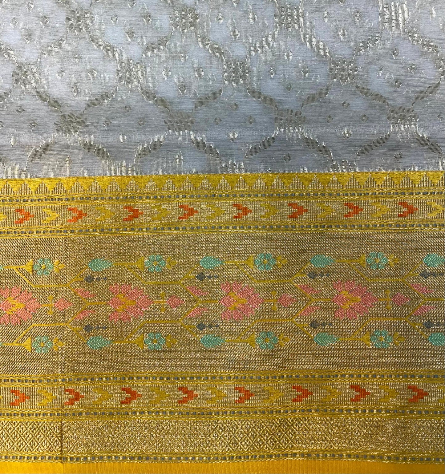 Yellow and Blue Organza Saree with Contrast Border and Allover Geometrical Body Design b0278ds