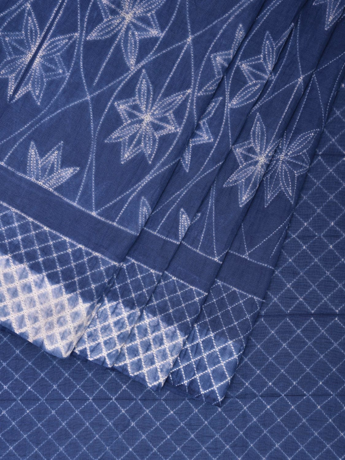 Blue Shibori Cotton Handloom Saree with Floral Body and Grill Pallu Design o0475