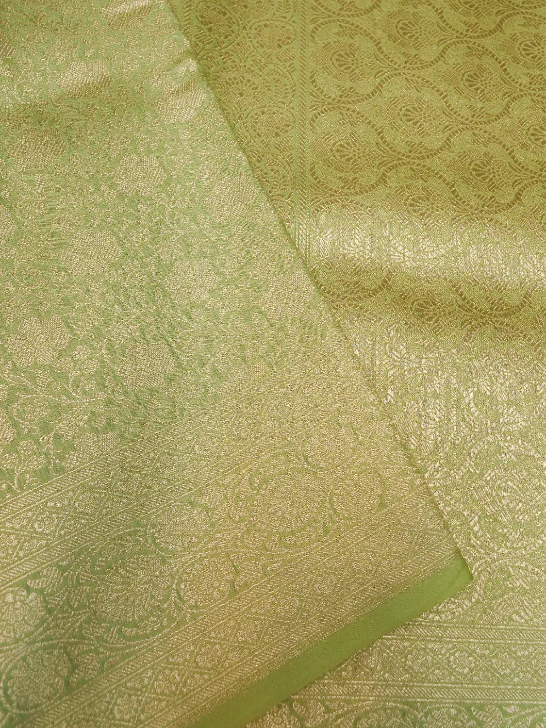 Pistachio Green Banarasi Katan Silk Saree with Luxurious Gold Brocade Jaal Weave DSK0034