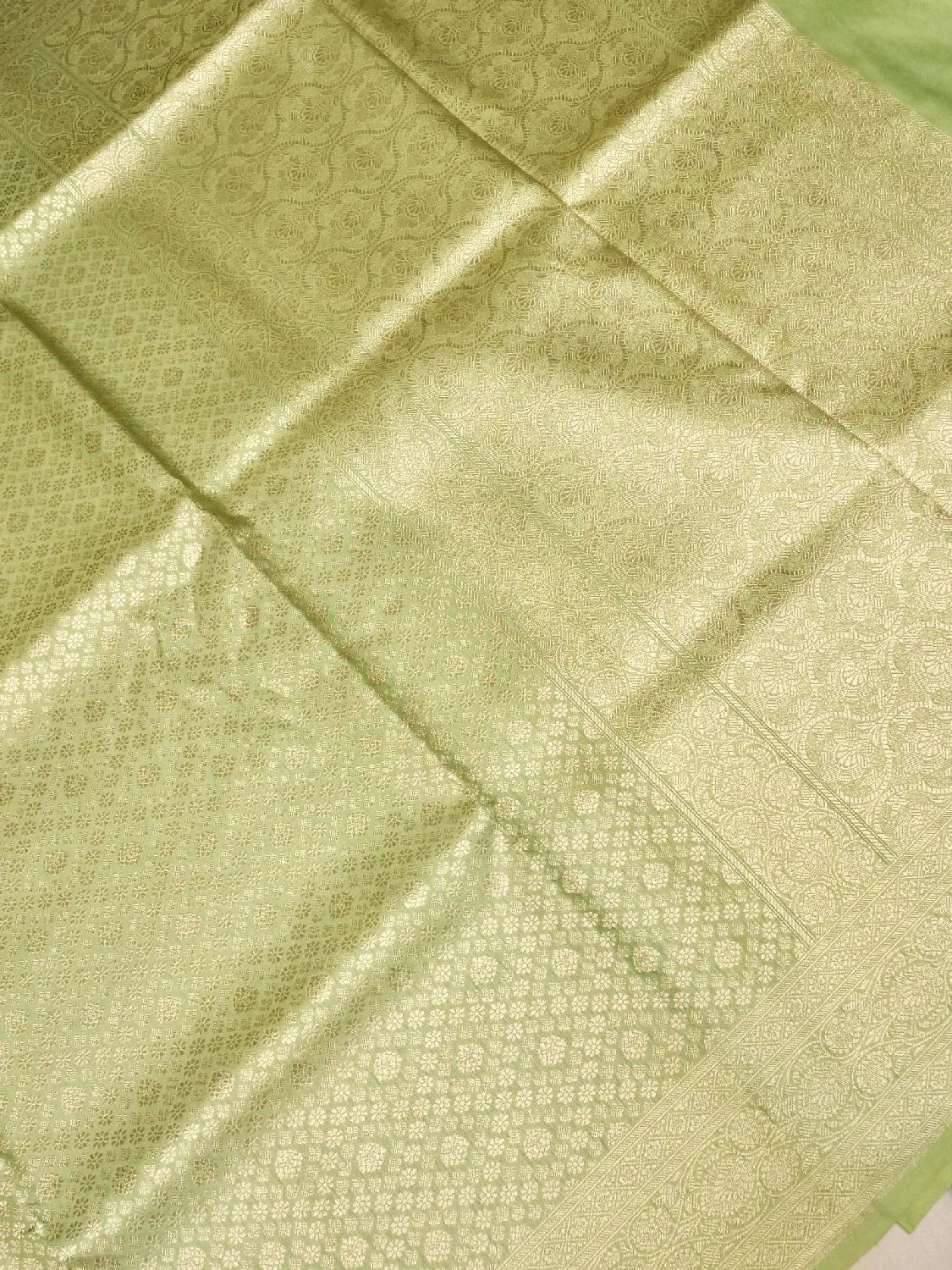 Rich Sage Green Banarasi Katan Silk Saree with Luxurious Gold Brocade Jaal Weave DSK0042