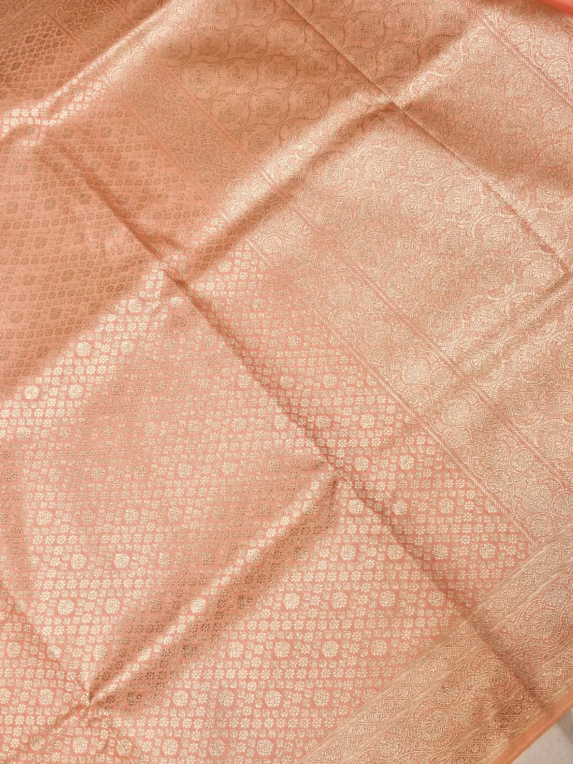 Luminous Peach Banarasi Katan Silk Saree with All-Over Gold Brocade Floral Jaal DSK0043