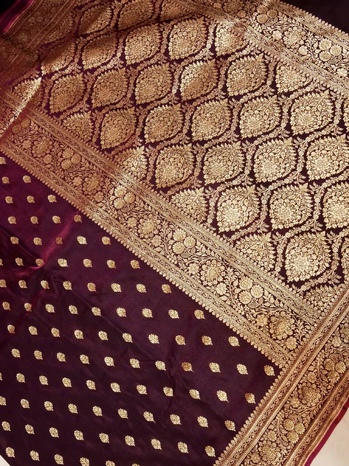 Exquisite Wine/Plum Banarasi Katan Silk Saree with Intricate Gold Zari Swarovski Crystal Stones Weave DSK0017