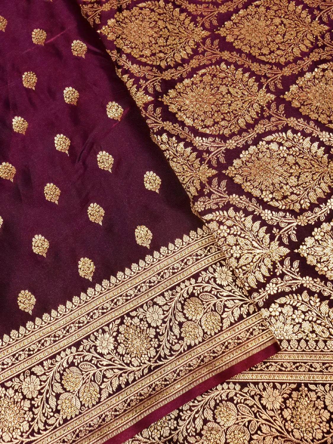 Exquisite Wine/Plum Banarasi Katan Silk Saree with Intricate Gold Zari Swarovski Crystal Stones Weave DSK0017