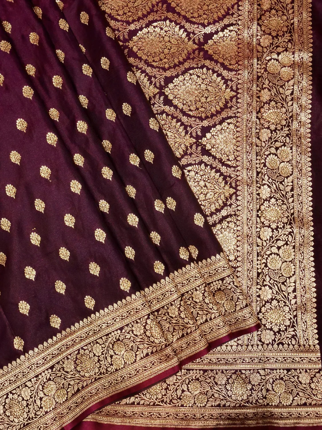 Exquisite Wine/Plum Banarasi Katan Silk Saree with Intricate Gold Zari Swarovski Crystal Stones Weave DSK0017