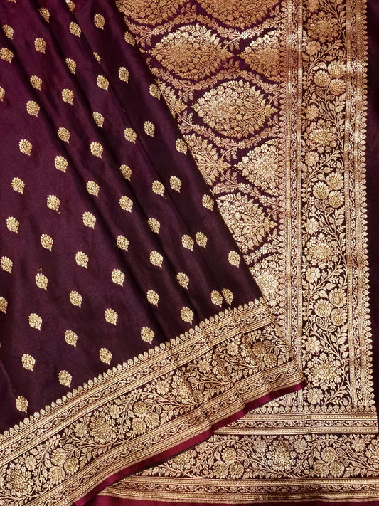 Exquisite Wine/Plum Banarasi Katan Silk Saree with Intricate Gold Zari Swarovski Crystal Stones Weave DSK0017