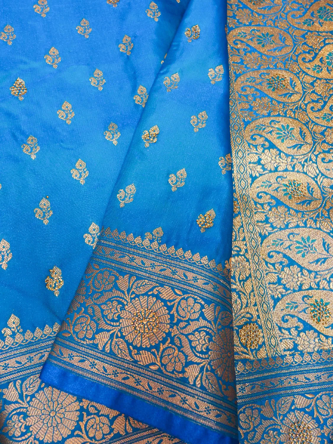 Vibrant Sky Blue Banarasi Silk Saree with Delicate Gold Zari Weave  DSK0025