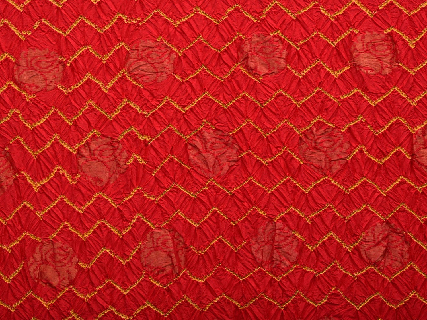 Red and Green Bandhani Uppada Silk Handloom Saree with Nilambari Buta Design bn0330